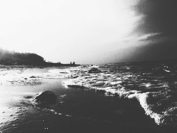 Scenic view of calm sea against sky