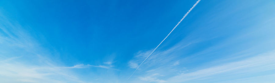 Low angle view of vapor trail in sky