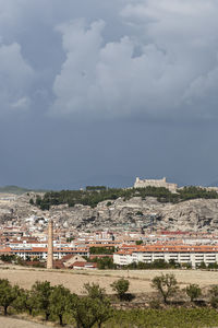 High angle view of buildings in city against sky