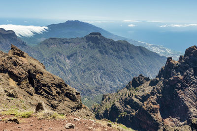 Scenic view of mountains against sky at roque de los muchachos 