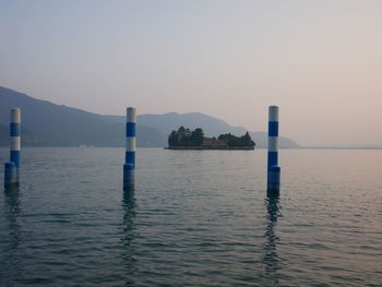 Scenic view of sea against clear sky during sunset