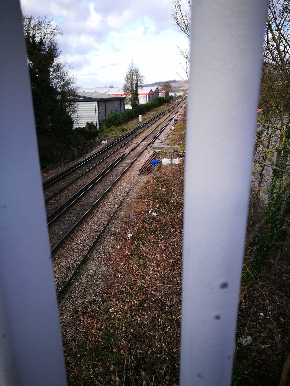 transportation, railroad track, no people, rail transportation, sky, day, outdoors, tree, the way forward, nature, architecture