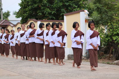 Group of people standing outdoors