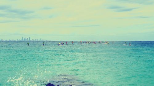 View of calm sea against cloudy sky