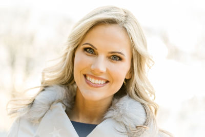 Close-up portrait of smiling woman