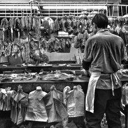 People at market stall