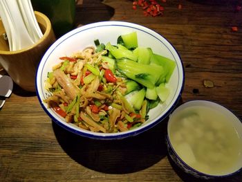 High angle view of chopped vegetables in bowl on table