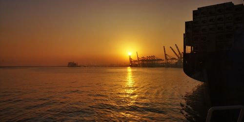 Scenic view of sea against sky during sunset