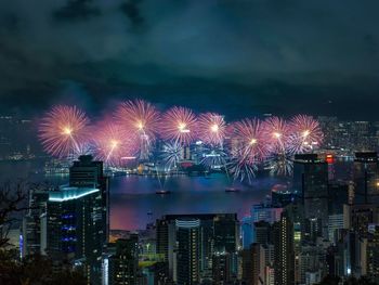 Firework display at night