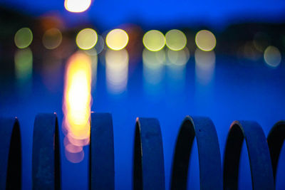 Defocused image of illuminated lights at night