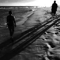 People walking on beach