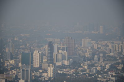 Modern buildings in city against sky