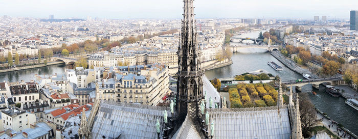 High angle view of city and buildings against sky