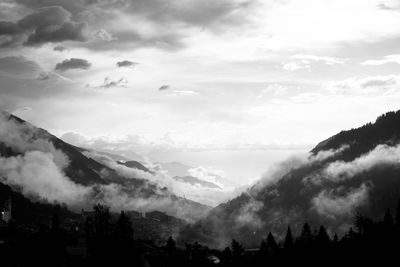 Scenic view of silhouette mountains against sky