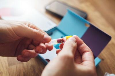 Close-up of person holding hands