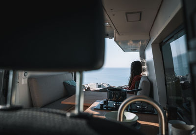 Woman sitting in bus