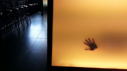 Reflection of man in mirror