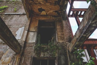 Low angle view of abandoned building