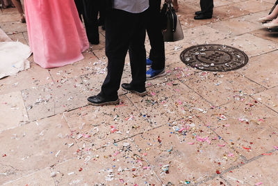 Low section of people standing at wedding