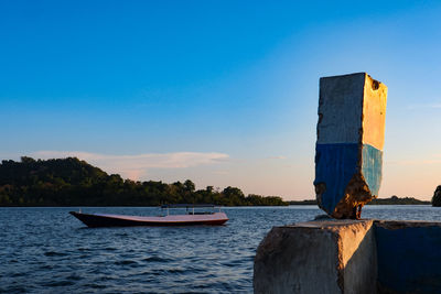 A fishing boat beside the pier