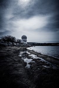 View of sea against cloudy sky