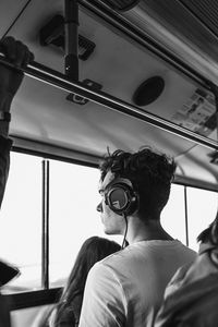 Low angle view of man at bus