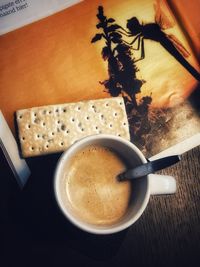 High angle view of coffee cup on table