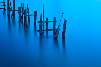 High angle view of abandoned pier in calm lake