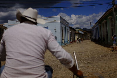 Rear view of man working at construction site