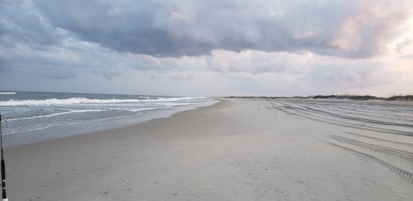 Scenic view of beach against sky
