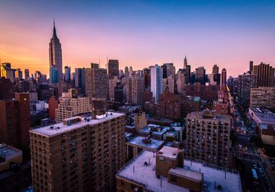 High angle view of city at sunset