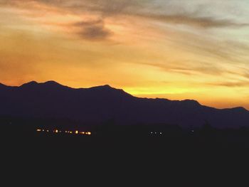 Scenic view of landscape against sky during sunset