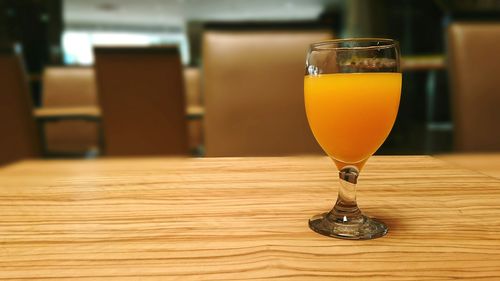 Close-up of beer glass on table