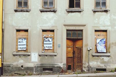 Campaign posters on old house