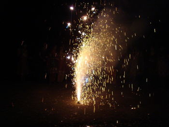 Firework display at night