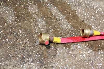 High angle view of multi colored umbrella on road