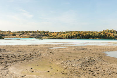 Scenic view of beach against sky