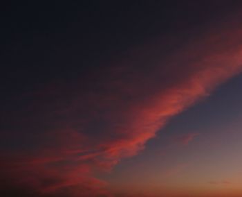 Low angle view of dramatic sky during sunset