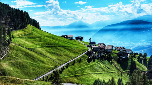 Panoramic view of landscape and sea against sky