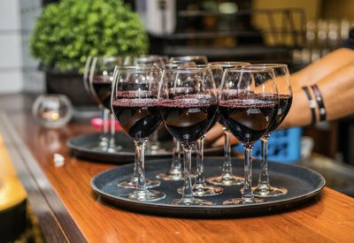 Close-up of wineglasses on table at restaurant