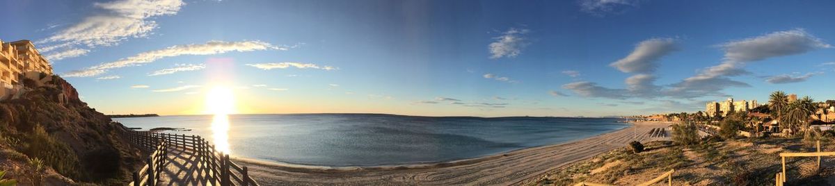 Panoramic view of sea against cloudy sky