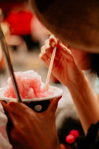 Close-up of woman holding ice cream