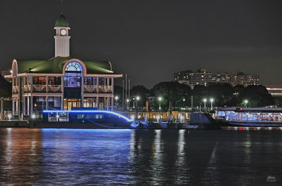 Illuminated buildings at waterfront