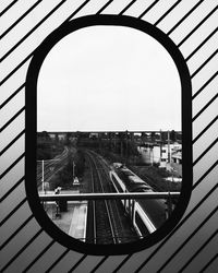 Railroad tracks seen through train window