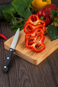 High angle view of red chili peppers on table