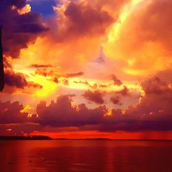 Scenic view of sea against cloudy sky