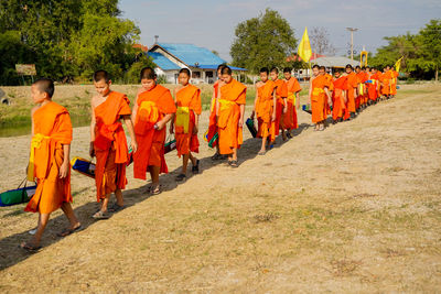 Rear view of people at temple