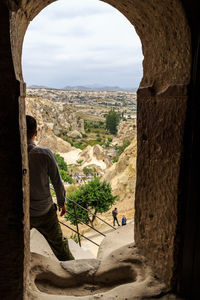 People looking at archway