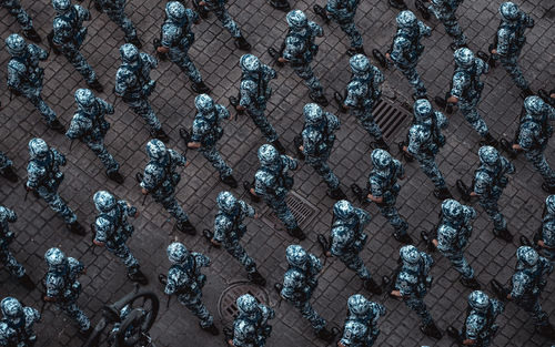 High angle view of soldiers walking on street