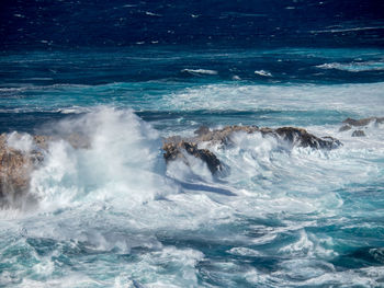 View of waves splashing in the sea